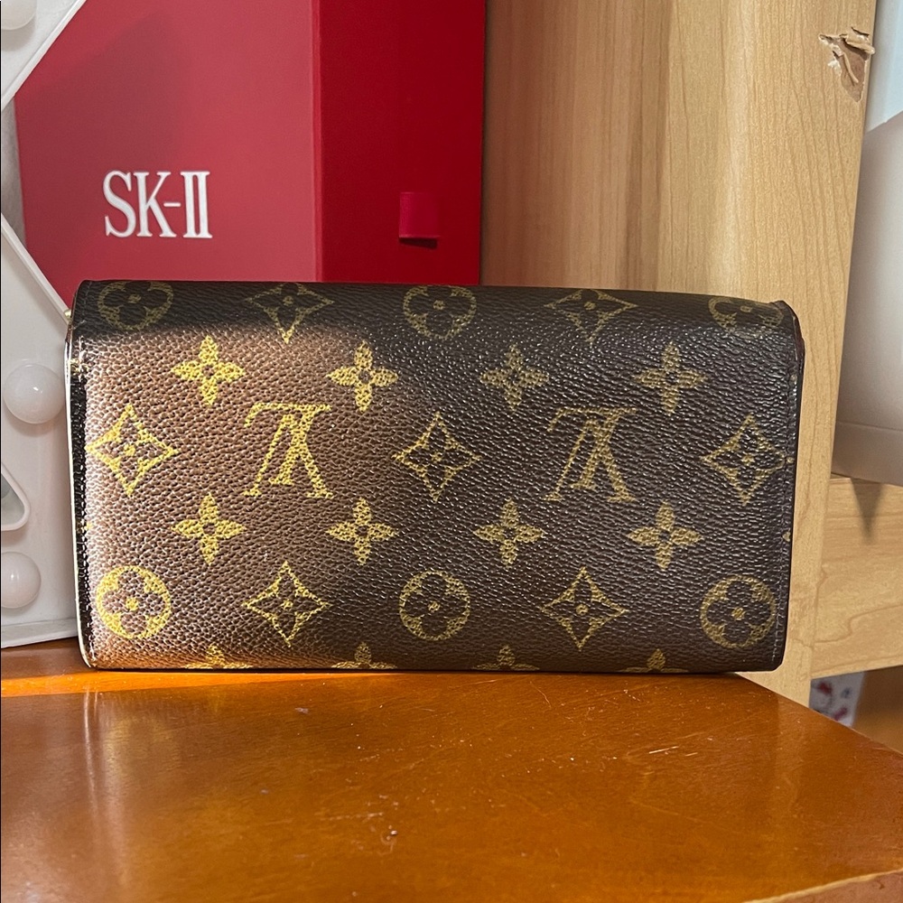 Louis Vuitton Black and Gold Monogram Wallet (Preloved) - Picture 2 of 12